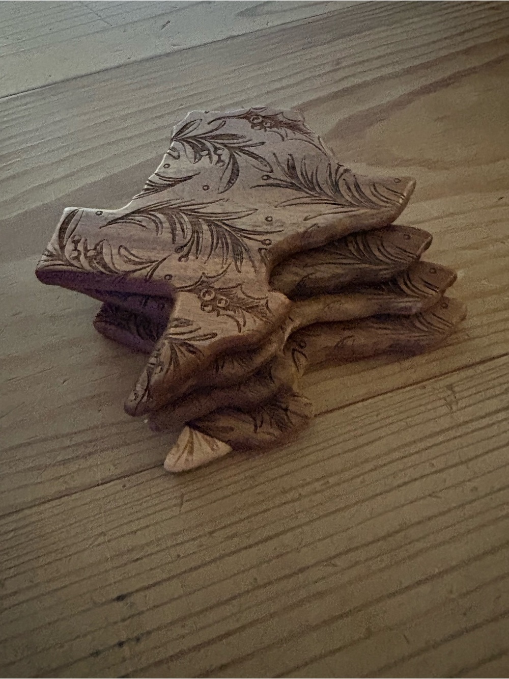 Hand-Carved Decorative Wooden Star Stack coasters.  Brown